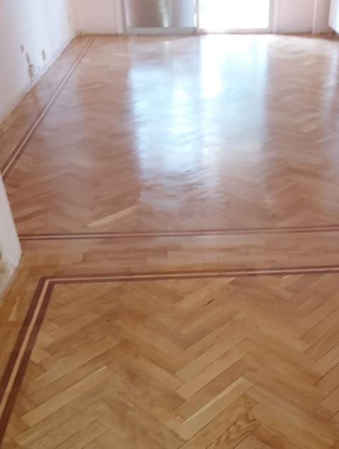 Parquet en espiga con cenefa perimetral